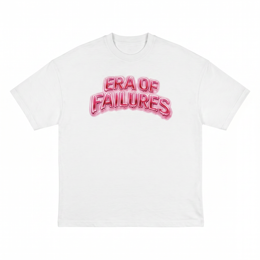 White t-shirt with pink 'ERA OF FAILURES' text on a white background